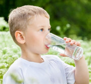 boy_drinking_glass_of_water-180x166-opt